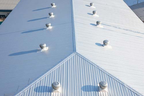 Arial view of white metal commercial roof