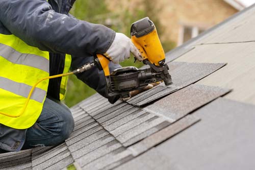 Installation with drill of new roofing